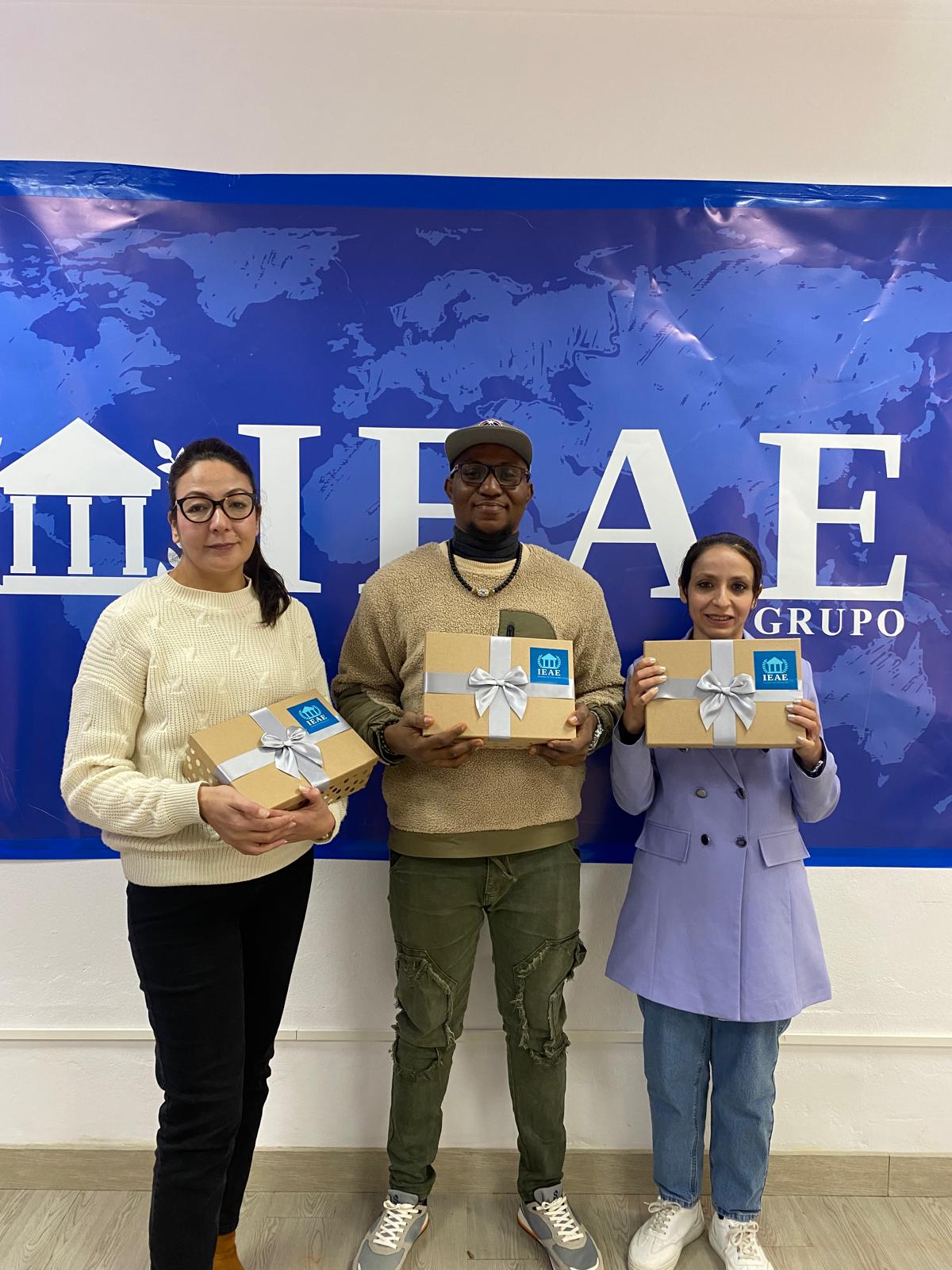 IEAE graduates with diplomas